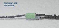 Schnellkupplung mit gr�nem Stecker und schwarzem Kabel, ADR- und IP68-zertifiziert.