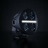 Rundes, schwarzes Strands LED Fahrlicht NUUK MC 3 mit vier Linsen und wei�em Positionslicht.