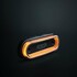 Strands Positionsleuchte LED mit schwarzem Geh�use und dunkler Linse, orange leuchtend.