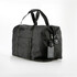 Schwarze Reisetasche mit integriertem OptiTag Slim Card Ortungsger�t.